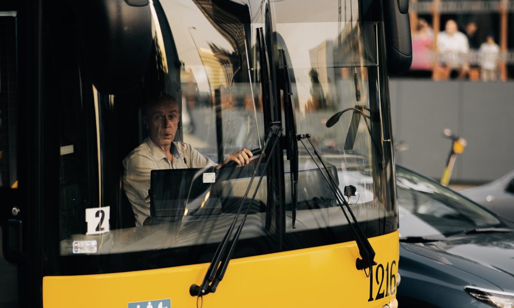 Man Driving a Bus